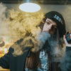 woman vaping in a vape shop