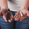 Alternative smoking background. Unrecognizable woman holding vape and tobacco cigarette in hands
